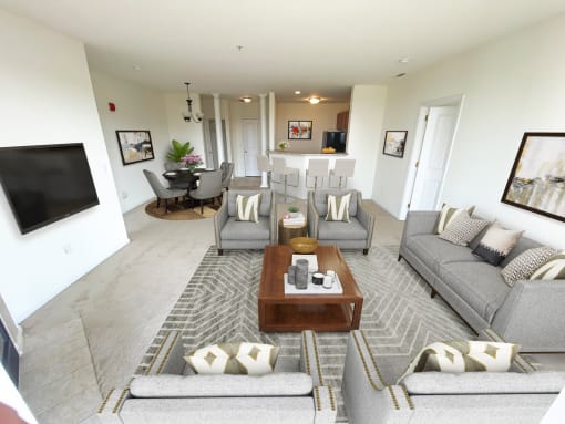 living room in a bedroom plus den unit.