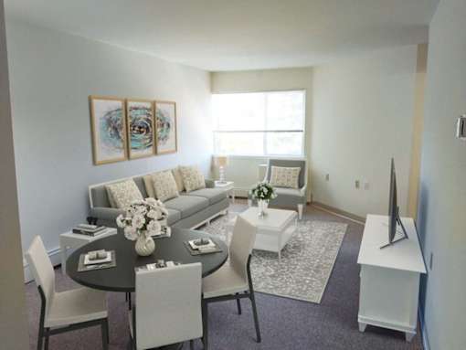 a living room with a couch and a table