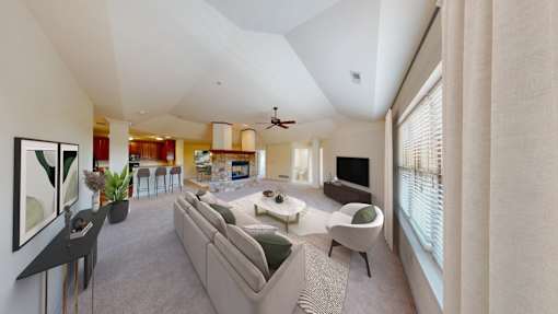 a living room with a couch and a table