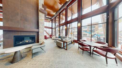 A living room with a fireplace and a couch.