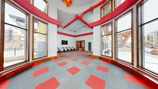 A room with a checkered floor and a red ceiling.