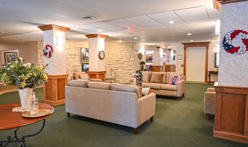 a living room with couches and a table