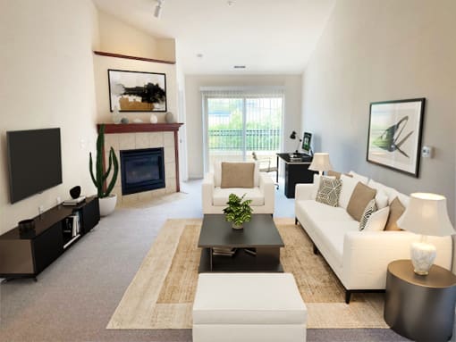 a living room with white furniture and a fireplace