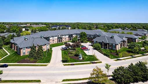 an aerial view of an apartment complex on a street