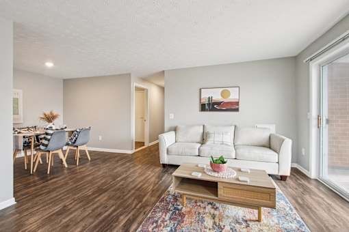 Living Room With Dining Area at CenterPointe Apartments & Townhomes, New York, 14424