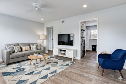 Spacious Living Area With TV at The Flats at Seminole Heights, Florida, 33603