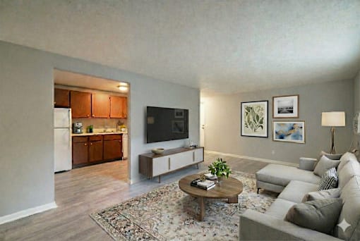 Living Area With TV at Willowbrooke Apartments & Townhomes, Brockport, NY, 14420