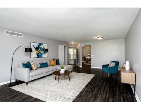 Living Room With Kitchen View at CenterPointe Apartments & Townhomes, Canandaigua, NY