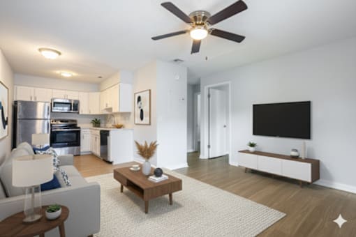 Living Room With Kitchen View at Fernwood Grove Apartments, Tampa, Florida