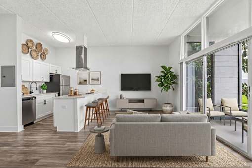 Open concept living area with modern kitchen at The Residences at Soho Apartments, Tampa, 33607