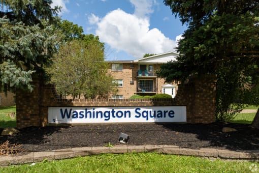 the square sign in front of a house