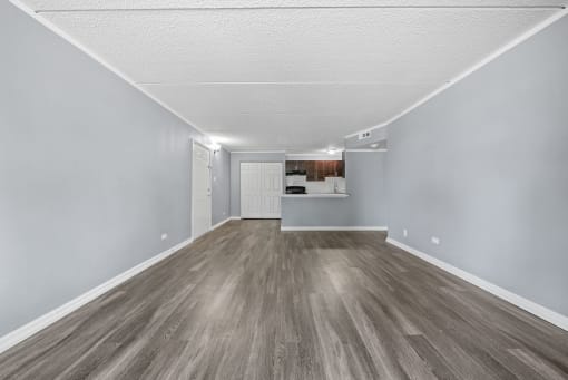 Wooden flooring Renovated Living Room at Woodland Ridge Apartments in Woodridge, IL