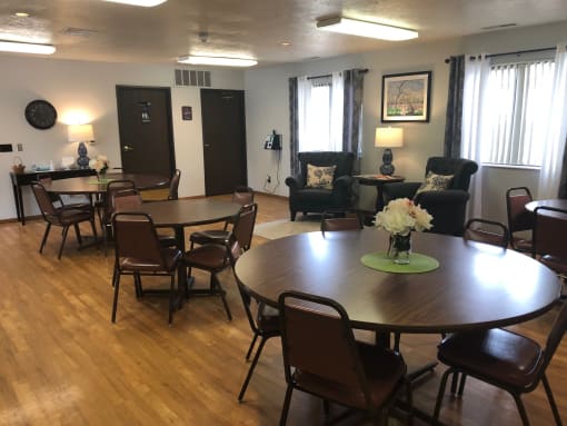 a large room with tables and chairs