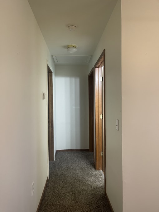 a view of the loft from the top of the stairs