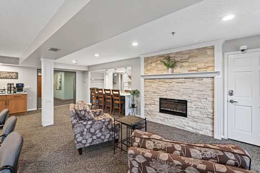 A living room with a fireplace and a couch.