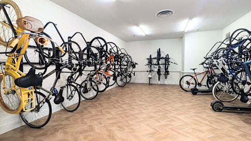 A room full of bicycles of different colors and types.