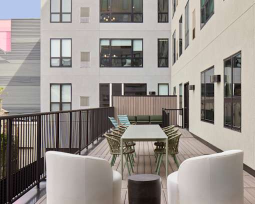 Patio with a table and chairs at 23 West Apartments, Philadelphia, PA, 19123