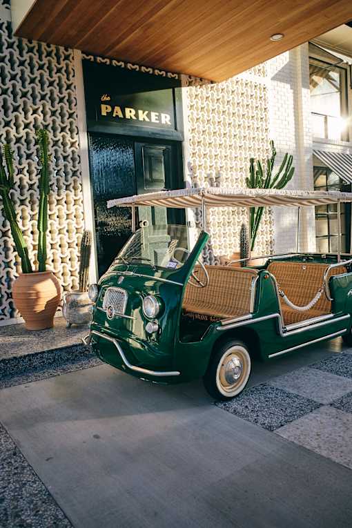 A green and white vintage car at The PARKER on E Mulberry Apartments, San Antonio, TX, 78209