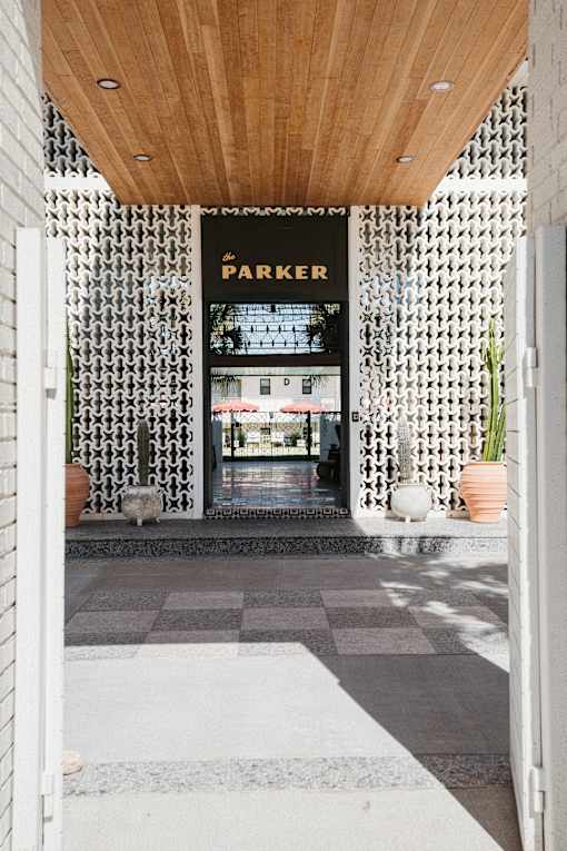 A white doorway leads to a Parker store at The PARKER on E Mulberry Apartments, San Antonio, Texas