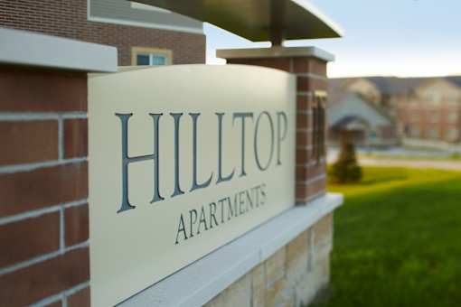 a sign for hilton apartments is seen in this undated file photo