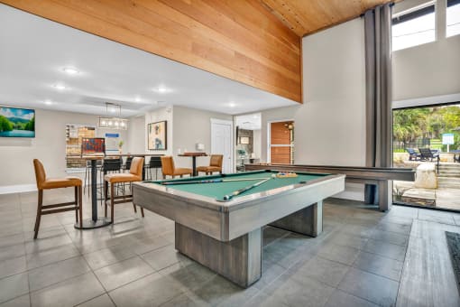 play a game of pool in our clubhouse at our apartments at Sunset Ridge, Texas, 78209