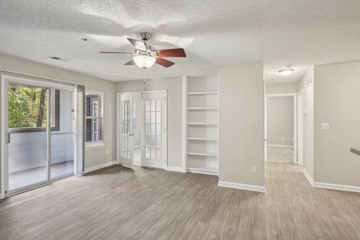 Room with glass doors at Radbourne Lake Apartments, Charlotte, 28269