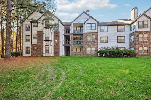 Lush green grassy area at Radbourne Lake Apartments, Charlotte, 28269