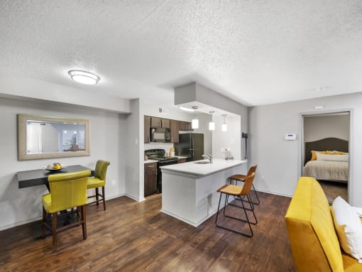 our apartments offer a living room with a kitchen and dining area