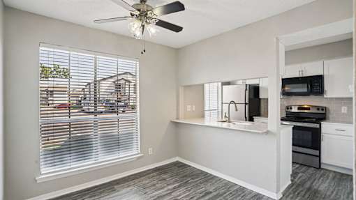 Room with ceiling fan at Keller Oaks, Carrollton, TX 75006