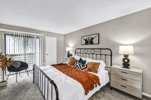 our apartments offer a bedroom with a bed and a balcony