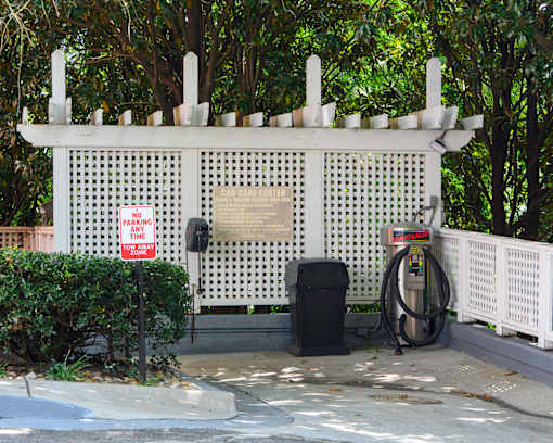 A car care center with a no parking sign in front.