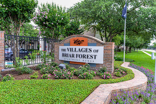 The Villages of Briar Forest Apartment Homes sign.