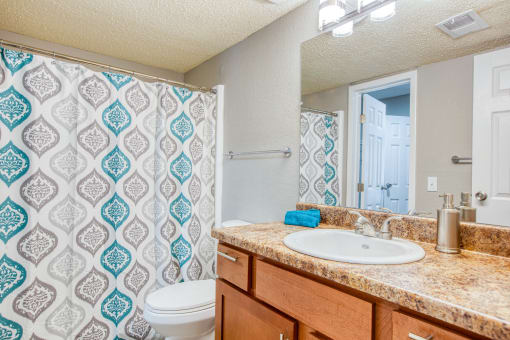 a bathroom with a shower toilet and sink at The Grove Brentwood, Nashville, TN ?