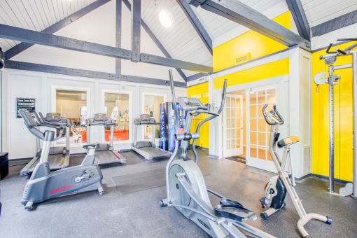 the gym with cardio equipment and weights at The Grove Brentwood, Nashville, 37211 