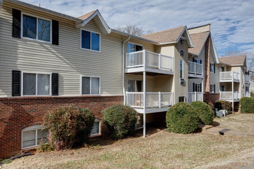 the view of an apartment building with a balcony and a brick wall at The Grove Brentwood, Tennessee ?