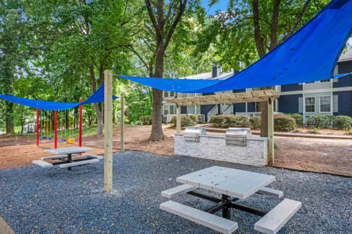 our apartments have a community picnic area with tables and chairs