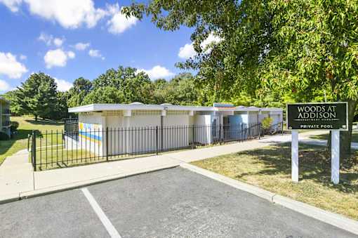 A private pool is located at Woods at Addison.