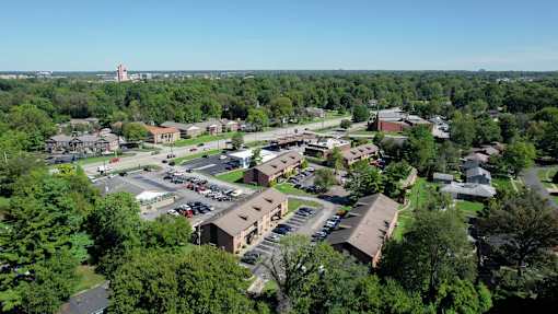 an aerial view of a neighborhood of buildings and trees