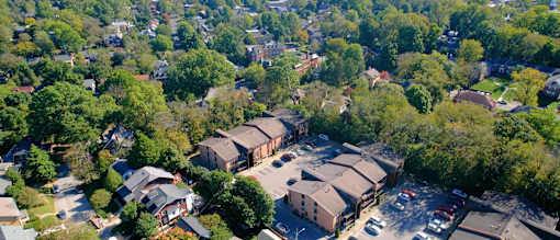 arial view of a neighborhood with houses and trees