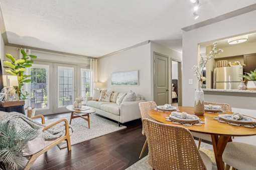 Dining and living room setting at Avenue in the Highlands Apartments in Louisville
