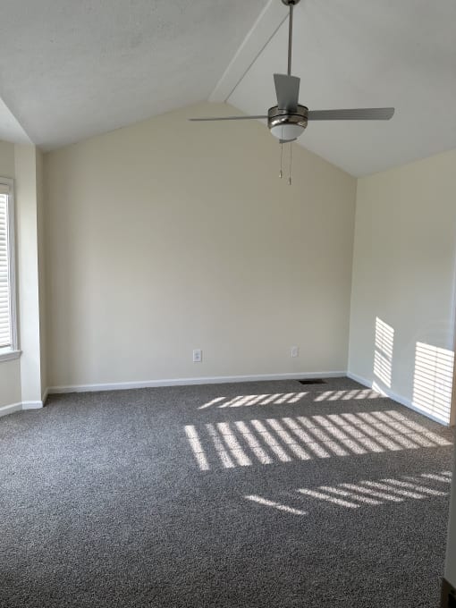 an overhead view of a room with a ceiling fan