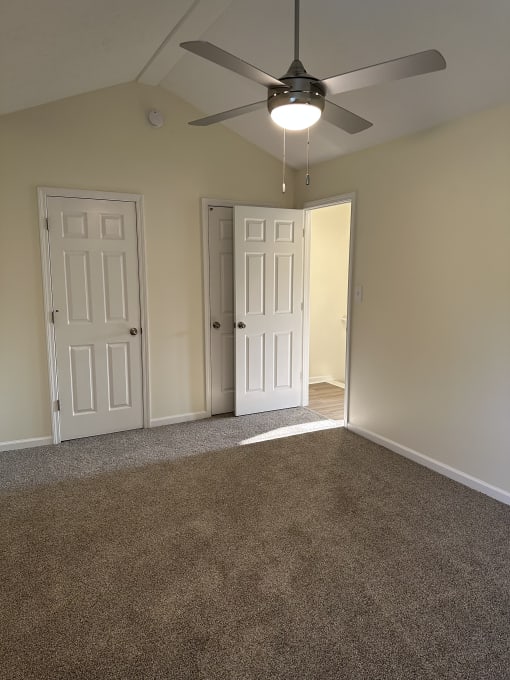 an overhead view of a closet and a ceiling fan