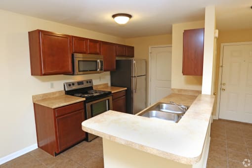 a kitchen with a counter top and a sink