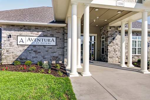 The front of a building with the name Aventura at St. Peters on it.