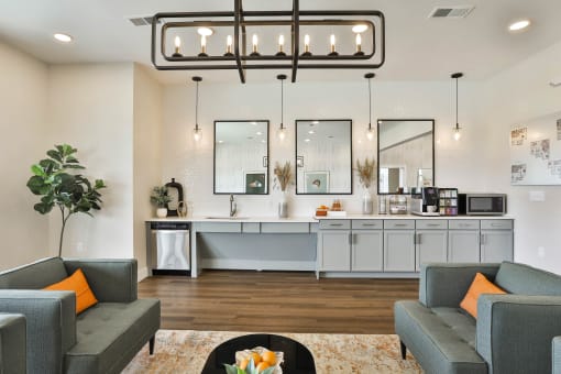 a living room with couches and a coffee table at Aventura at Hawk Ridge, Lake St Louis
