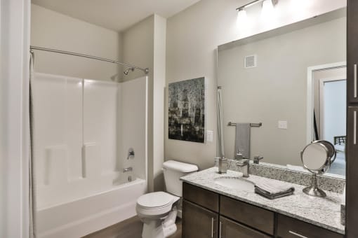 a bathroom with a shower toilet and sink at Aventura at Hawk Ridge, Lake St Louis, MO