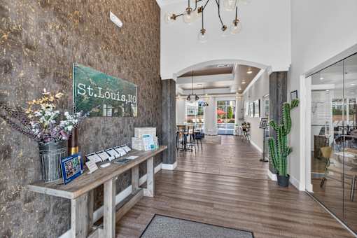A reception area with a sign that says St. Louis, MO.