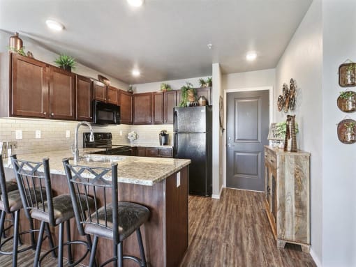 Kitchen with Granite Countertops and Breakfast Bar