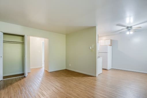 a living space with hardwood flooring
