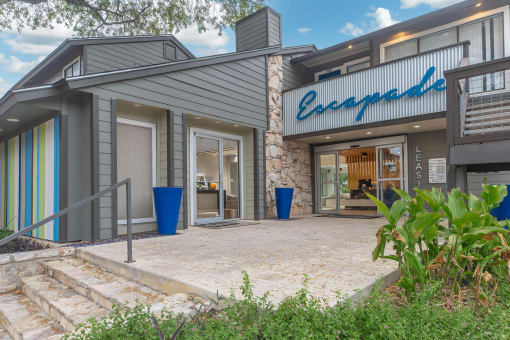 a view of the front of a building with stairs and a sidewalk at The Escapade, San Antonio